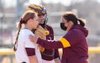 Gophers coach Piper Ritter, right, talked to one of her pitchers two seasons ago. Minnesota lost its Big Ten opener at Northwestern on Friday.