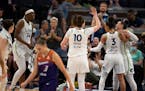 The Lynx celebrated after Phoenix called a timeout after a fourth quarter three pointer by Minnesota Lynx guard Kayla McBride (21).