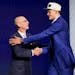 Timberwolves draft pick Walker Kessler, shown here shaking hands with NBA Commissioner Adam Silver while wearing a Memphis Grizzlies cap.