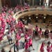 Abortion rights supporters gather for a “pink out” protest organized by Planned Parenthood in the rotunda of the state Capitol Wednesday, June 22,