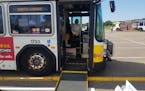 Bus driver Hernan Alvarado lowered a wheelchair ramp while participating in qualifying rounds of Metro Transit’s Bus Roadeo Thursday at the Mall of 