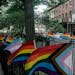 Flags affirming LGBTQ identity dress the fencing surrounding the Stonewall National Monument, Wednesday, June 22, 2022, in New York.