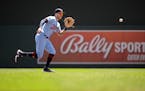 Minnesota Twins shortstop Carlos Correa (4) fields a ground ball hit by Cleveland Guardians second baseman Andres Gimenez (0) in the top of the second