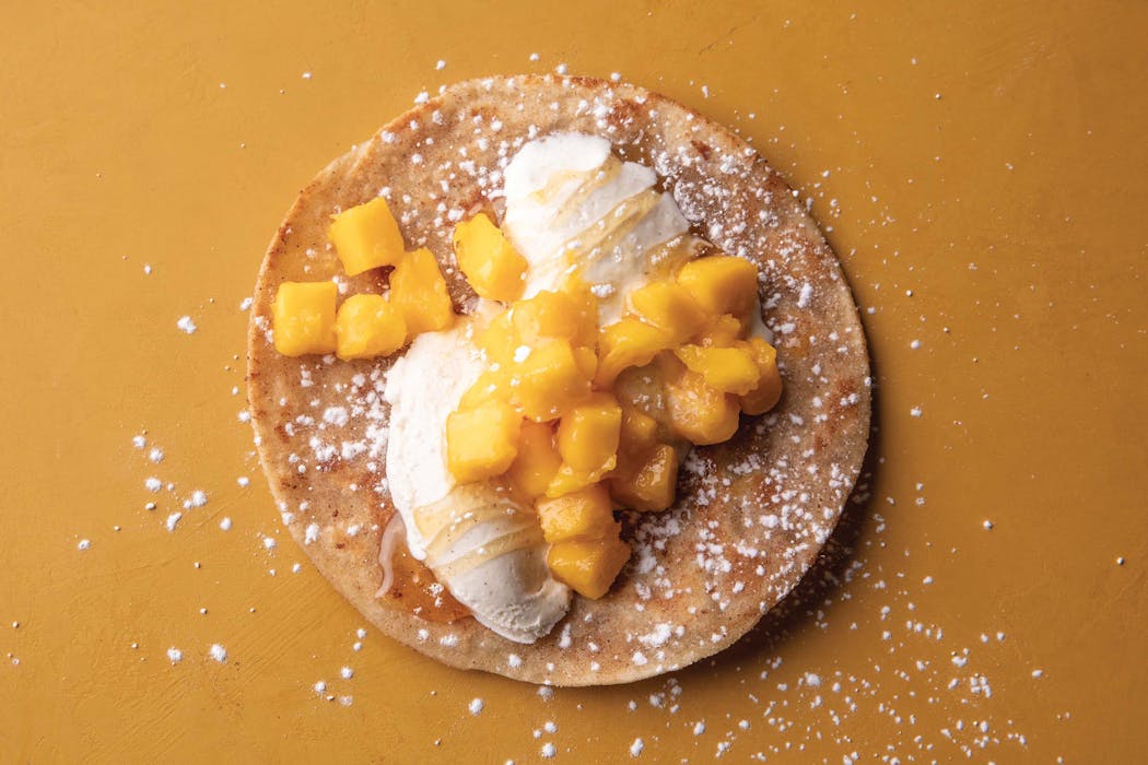Fruit and ice cream — in taco form — make for a summery dessert.