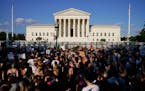 The streets were filled with protesters outside the U.S. Supreme Court Friday in Washington after the court’s decision to overturn Roe v. Wade.