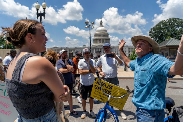 Abortion-rights protesters and anti-abortion protesters face-off during demonstrations outside the Supreme Court in Washington, Saturday, June 25, 202