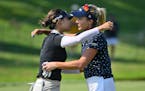 In Gee Chun hugged Lexi Thompson after Chun won the KPMG Women’s PGA Championship at Congressional Country Club in Bethesda, Md., on Sunday.