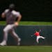 With C.J. Cron rounding the bases, Twins center fielder Mark Contreras pulled in a deep fly ball off the bat of the Rockies’ Elehuris Montero to end
