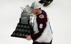 Avalanche defenseman Cale Makar skated with the Conn Smythe Trophy for being the playoff MVP on Sunday night.