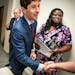 Mayor Jacob Frey and co-chair Nekima Levy Armstrong wrapped things up at the Minneapolis Urban League on Monday. In the background were working group 