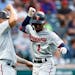 Minnesota Twins' Nick Gordon (1) celebrates with Gary Sanchez after hitting a two-run home run against the Cleveland Guardians during the sixth inning