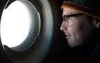Peter Neff, a climate scientist at the University of Minnesota, looked out the window of a C-17 on the way to Antarctica in 2012. Neff has been to the