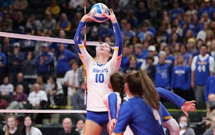 Wayzata’s Stella Swenson set the ball during the Minnesota Class 4A state volleyball championship last season.