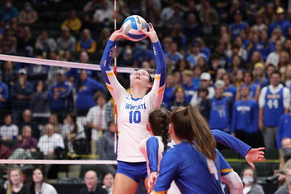 Wayzata’s Stella Swenson set the ball during the Minnesota Class 4A state volleyball championship last season.