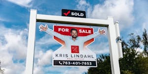 Kris Lindahl’s arms-out pose is coming to his company’s lawn signs. Lindahl wants to trademark the pose.