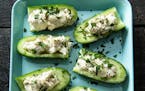 Cucumbers stuffed with herbed cheese, a refreshing summer snack or side to burgers.
