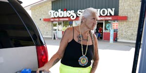 Julie Hernandez-Corado topped off her GMC Yukon at Tobies Station in Hinckley this week. “I don’t know how people live,” she said, referring to 