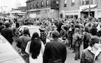 April 19, 1972: A crowd filled SE. 4th St. in Dinkytown as a group of antiwar demonstrators occupied the U.S. Air Force recruiting office. The brief o