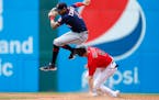 Twins shortstop Carlos Correa forced out Cleveland’s Owen Miller at second on Thursday.