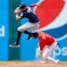 Twins shortstop Carlos Correa forced out Cleveland’s Owen Miller at second during the third inning Thursday at Progressive Field.
