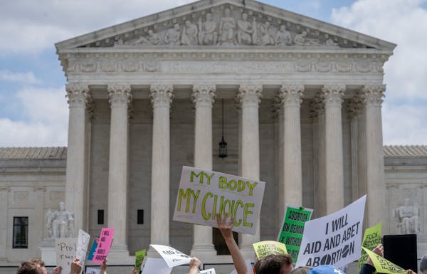Abortion-rights protesters protest following the Supreme Court’s decision to overturn Roe v. Wade, the federally protected right to abortion, outsid