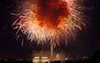 Fireworks explode over Lincoln Memorial, Washington Monument and U.S. Capitol along the National Mall in Washington, during the July 4th celebration i