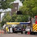 Emergency personnel on a closed University Ave. Thursday afternoon in Minneapolis after a suspected gas leak on SE. University Avenue and a fire at a 