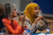 U.S. Rep. Ilhan Omar, D-Minn., sitting next to U.S. Rep. Robin Kelly, D-Ill., led the Gun Violence Community Conversation at North High in Minneapolis