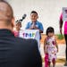 Council Member Dai Thao watched his son, 7-year-old Justice, deliver a speech on June 15 on the importance of the SPARK initiative in St. Paul.