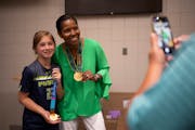 Soccer icon Briana Scurry met young players Wednesday in Plymouth, including fellow goalie Grace Benson.