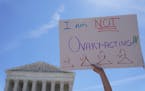 An abortion rights supporter held a sign reading “I am not Ovary-Acting,” during a protest outside of the U.S. Supreme Court, on June 28, 2022, in