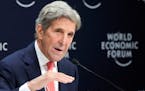 John F. Kerry, Special Presidential Envoy for Climate of the United States, gestures during a news conference at the World Economic Forum in Davos, Sw