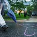 A hanger symbolizing abortion is drawn in chalk on the ground outside the home of Supreme Court Justice Brett Kavanaugh as abortion rights advocates p