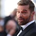 FILE - Ricky Martin poses for photographers upon arrival at the premiere of the film ‘Elvis’ at the 75th international film festival, Cannes, sout