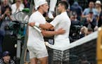 Serbia’s Novak Djokovic hugged Tim van Rijthoven of the Netherlands after defeating him a men’s fourth-round singles match at Wimbledon on Sunday.