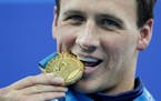 U.S. swimmer Ryan Lochte is putting all of his silver and bronze Olympic medals up for action, hoping to raise money for a children’s charity.