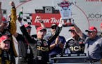 Tyler Reddick and his crew celebrated after he held off Chase Elliott to win the Kwik Trip 250 at Road America in Elkhart Lake, Wis., on Sunday.