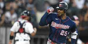 Byron Buxton looked toward his Twins teammates in the dugout after hitting a two-run home run during the fifth inning against the White Sox in Chicago