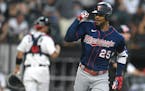 Byron Buxton looked toward his Twins teammates in the dugout after hitting a two-run home run during the fifth inning against the White Sox in Chicago