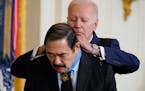 President Joe Biden awards the Medal of Honor to Spc. Dennis Fujii for his actions on Feb. 18-22 1971, during the Vietnam War, during a ceremony in th
