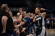 After being fouled shooting in the third quarter, Lynx forward Aerial Powers (3) celebrated last Sunday with fans sitting courtside. She scored a game