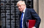 British Prime Minister Boris Johnson leaves 10 Downing Street in London, Wednesday, July 6, 2022. A defiant British Prime Minister Boris Johnson is ba