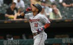 Minnesota Twins’ Jorge Polanco celebrated while rounding the bases after hitting a two-run home run during the fifth inning against the Chicago Whit