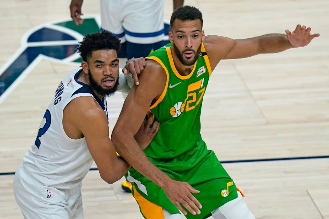 Wolves center Karl-Anthony Towns, left, and Jazz center Rudy Gobert were once adversaries. Now they’re teammates, and how well they worked together on the floor will determine the Wolves’ future for years to come.