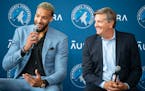 New Minnesota Timberwolves center Rudy Gobert makes head coach Chris Finch laugh at a press conference introducing Gobert as the newest member of the 