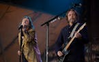 Brothers Chris, left, and Rich Robinson performed with a new lineup of the Black Crowes at Mystic Lake Casino Amphitheater on Monday.