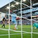 Sporting Kansas City goalkeeper John Pulskamp and defender Andreu Fontàs reacted to an own goal by Fontàs in the first half Wednesday night at Allia