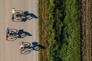 Bob Timmons, Tim Torgerson and Dan Winga cycle along 183rd Avenue in Fillmore Township Wednesday, June 29, 2022 in Southeast Minn. ] Aaron Lavinsky �
