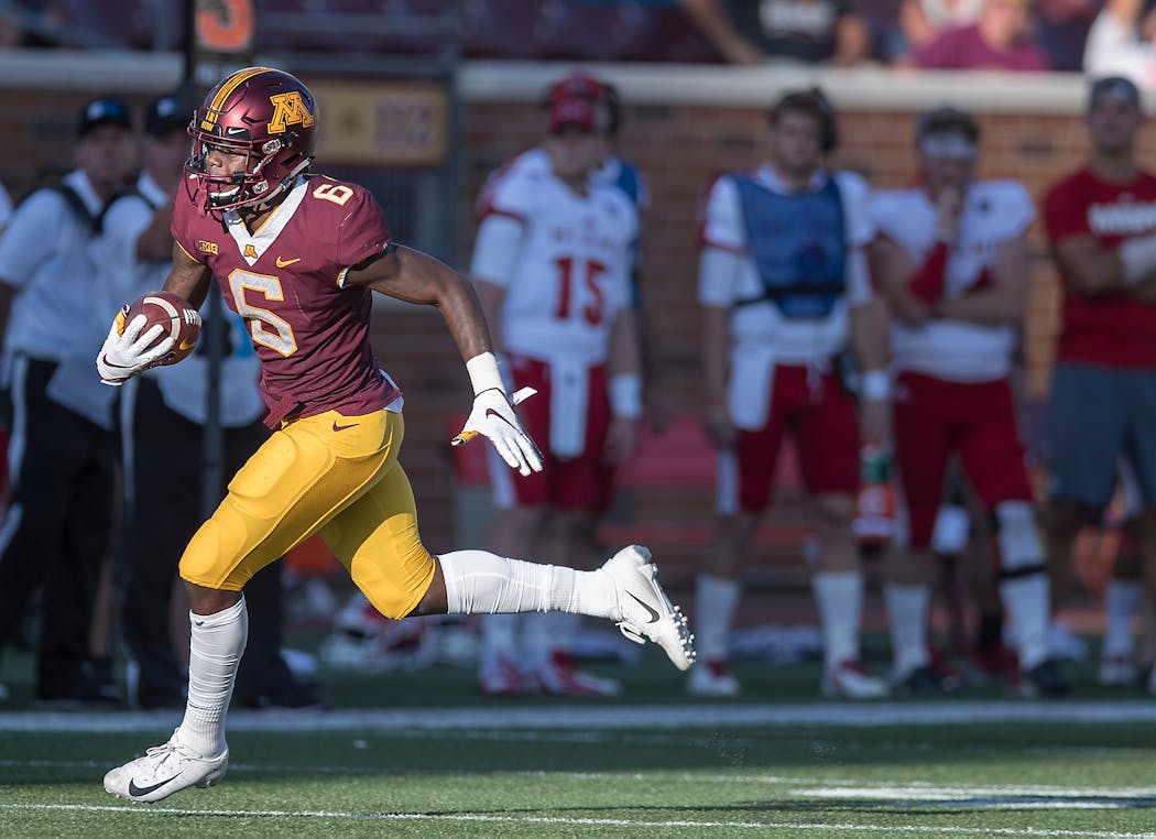 Minnesota’s wide receiver Tyler Johnson ran with the ball for a first down during the fourth quarter as Minnesota took on Miami (Ohio) in 2018.  