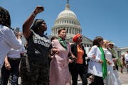 Democratic lawmakers take part in an abortion rights rally outside the Capitol on Tuesday. At least 17 House Democrats, including Rep. Ilhan Omar, wer